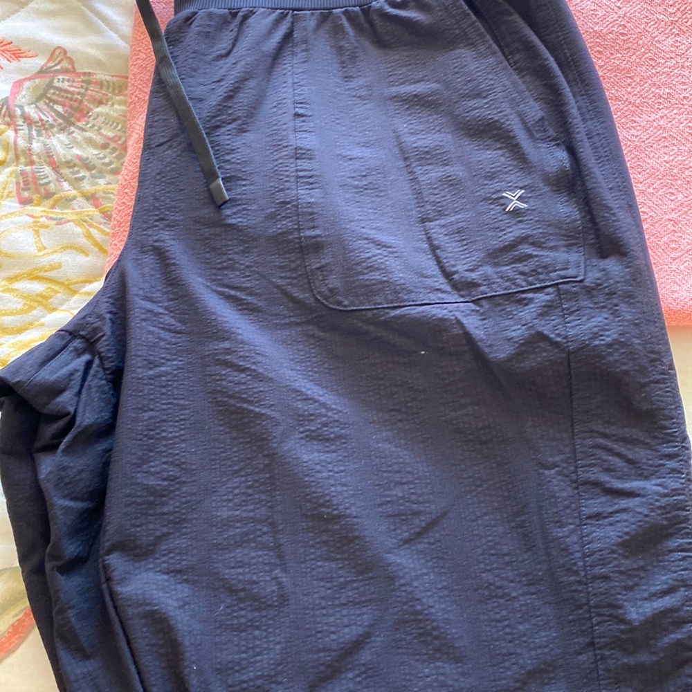 Nylon joggers by X ersion. Women’s black nylon draw string waste.